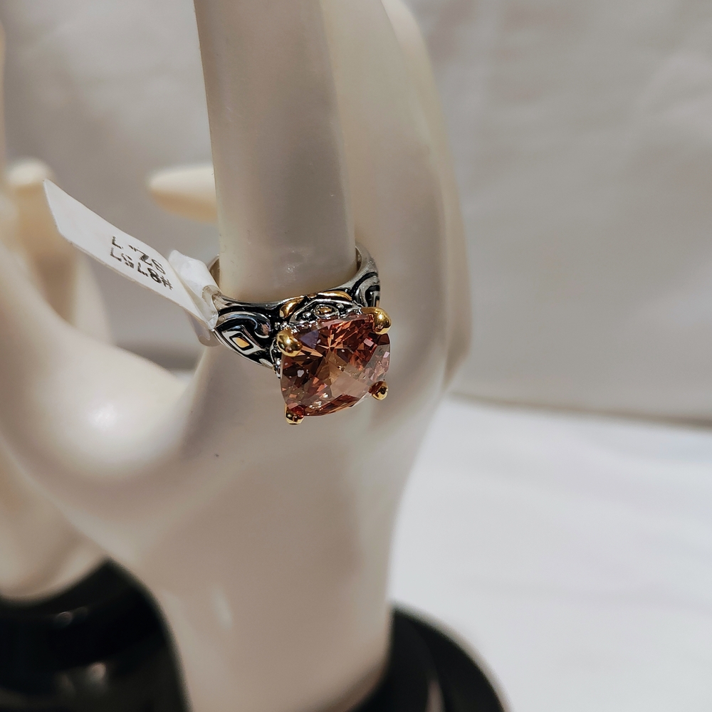Elegant Gold and Silver Toned Ring with Orange Cubic Zirconia Stone